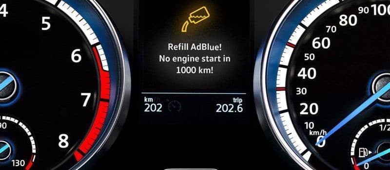 Car dashboard displaying AdBlue refill light, a service offered by Handy Speedy in Hull